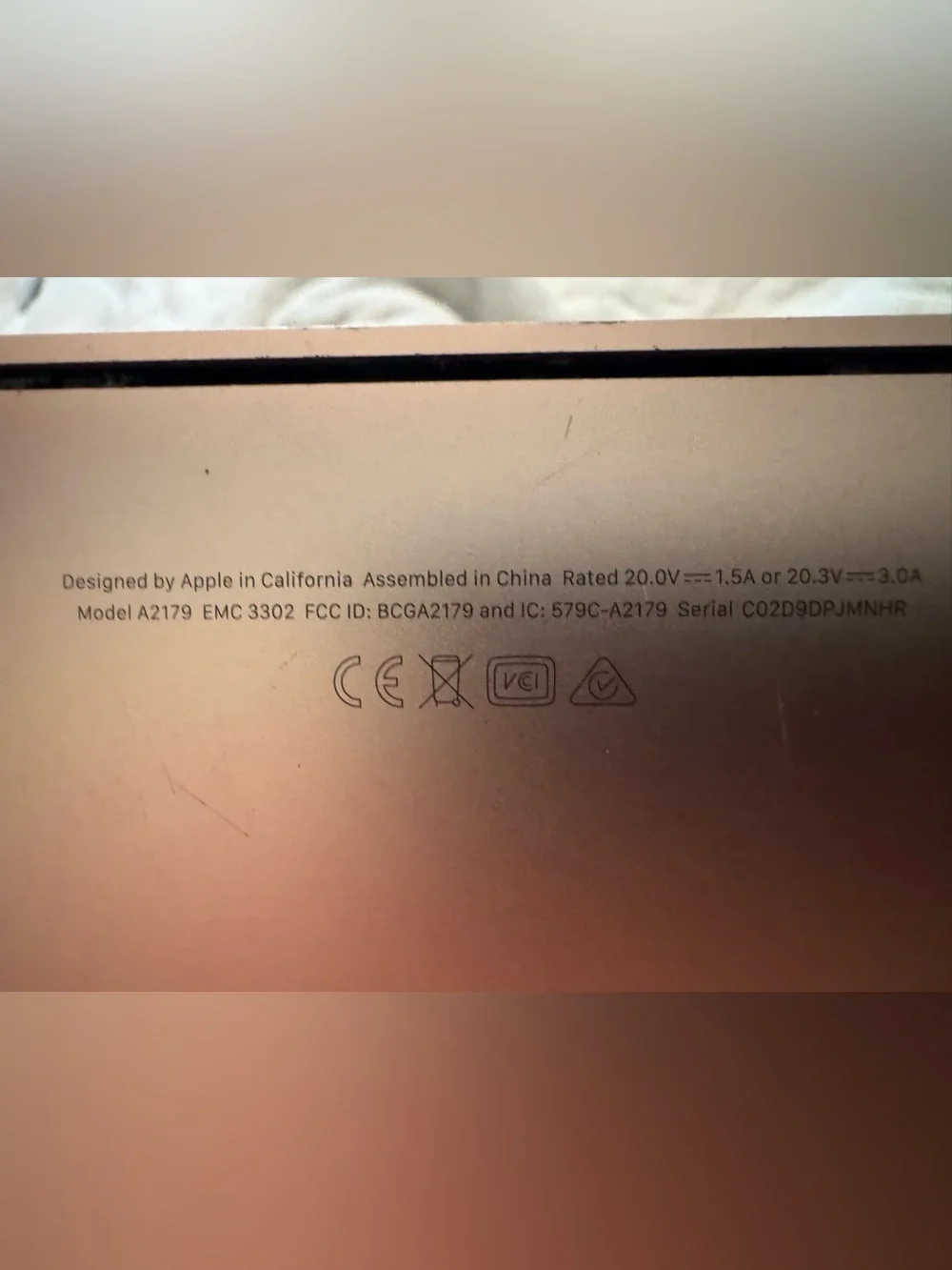 Apple Rose Gold MacBook M2179 does not turn on. For parts or repair only.